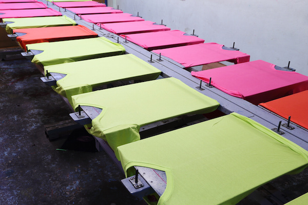 t-shirts on screen table