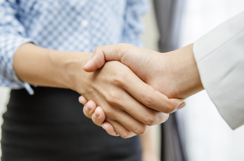 Businesswomen handshake